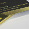 Blackmagic schwarze Visitenkarten mit Folienschnitt gold