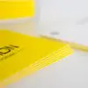 Colorplan Visitenkarten kaschiert factory yellow und weiß mit Offsetdruck schwarz Colorplan Visitenkarten kaschiert sandwichkarten