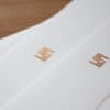 Briefpapier mit zweifarbiger Folienpraegung in Kupfer Roségold Briefpapier mit zweifarbiger Folienpraegung in Kupfer