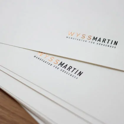 Briefpapier mit Folienpraegung in Kupfer und schwarz